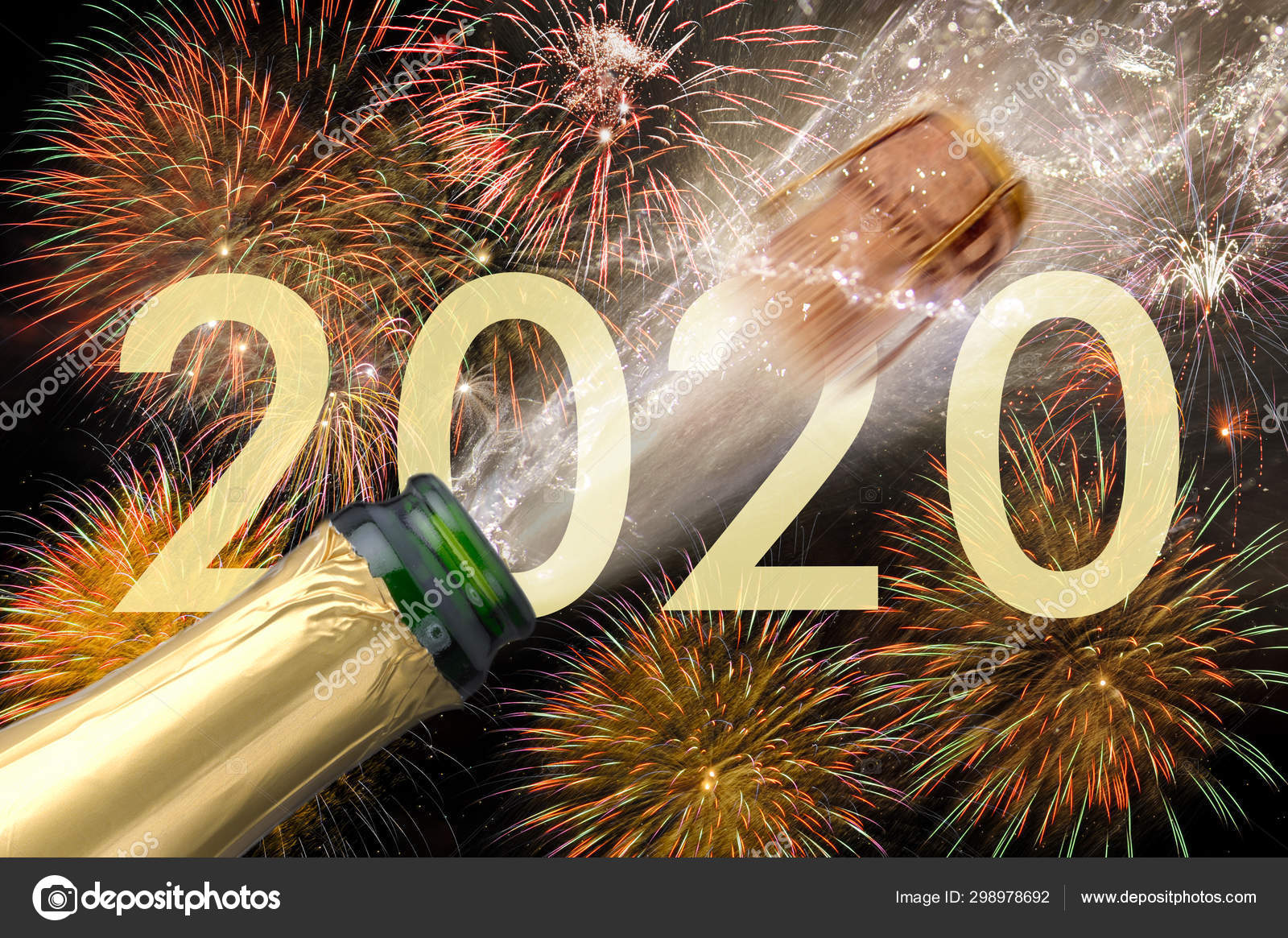 Happy new year 2020 with firework and splashing bottle of ...
