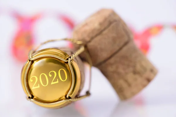 Happy new year 2020 with cork stopper of bottle champagne — Stock Photo, Image