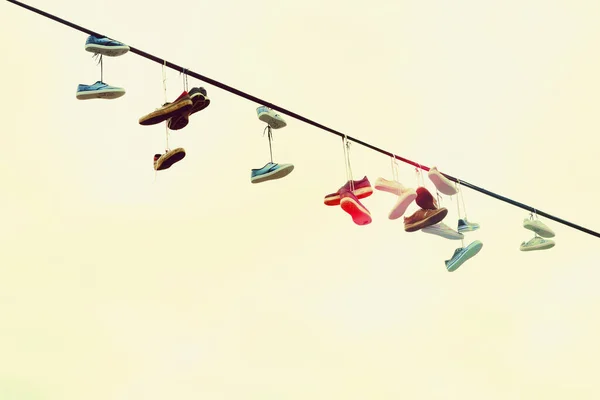 Shoes hanging on a rope — Stock Photo, Image