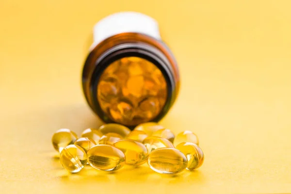 Omega Gel Capsules Fish Oil Pills Healthy Omega Yellow Background — Stock Photo, Image