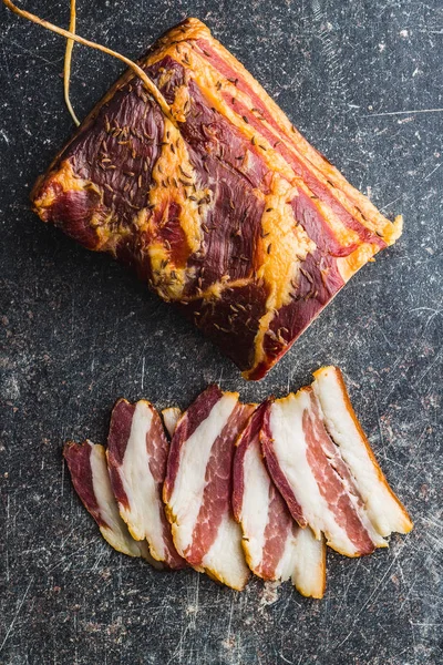 Sliced smoked bacon. — Stock Photo, Image