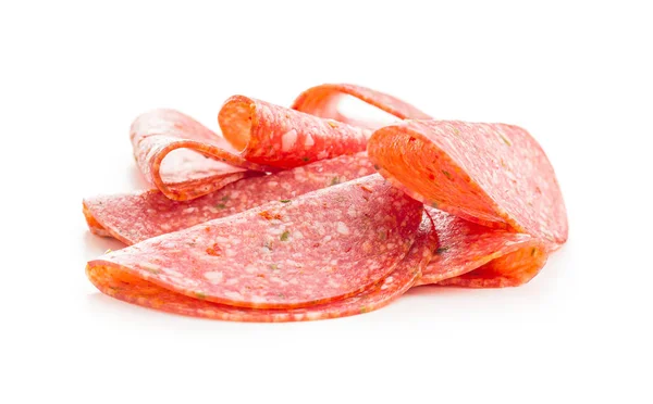 Salami smoked sausage slices with spice chili peppers. — Stock Photo, Image