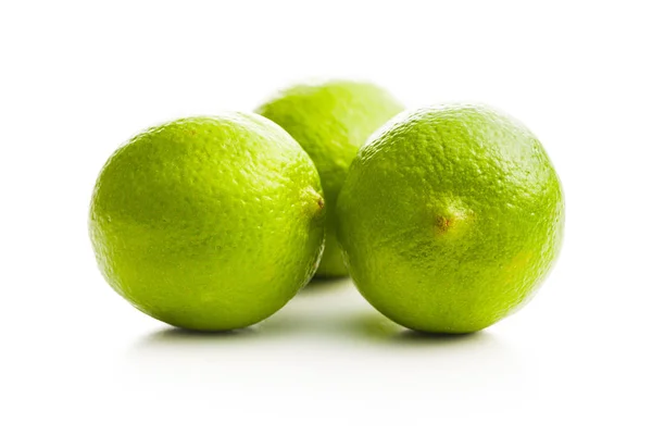 De gröna limefrukterna. — Stockfoto