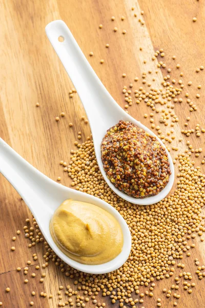 Yellow mustard and whole grain mustard. — Stock Photo, Image