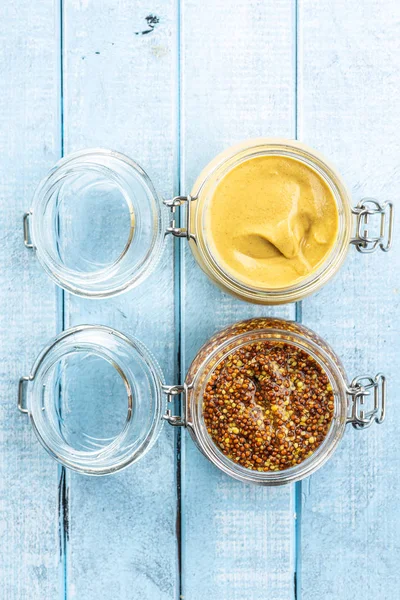 Yellow mustard and whole grain mustard. — Stock Photo, Image