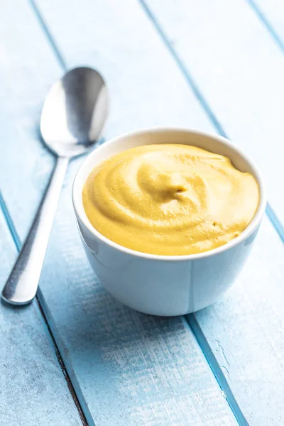 Yellow mustard in bowl. — Stock Photo, Image