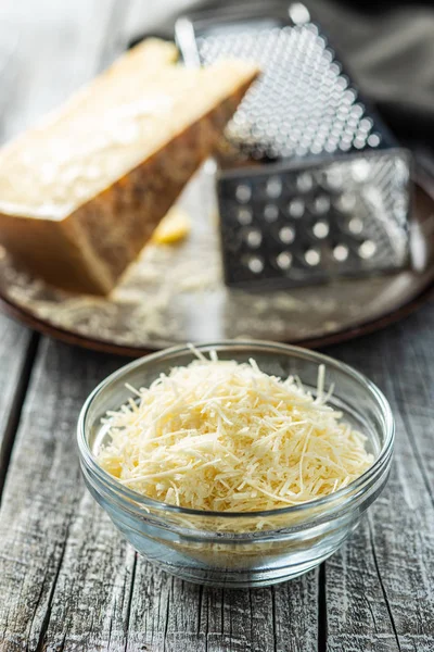 Tasty grated cheese. Parmesan cheese. — Stock Photo, Image