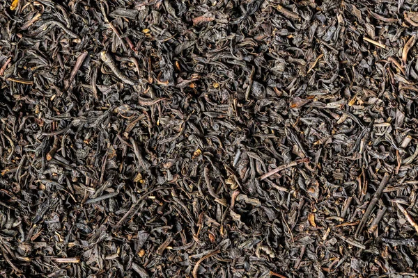 Hojas secas de té negro. —  Fotos de Stock