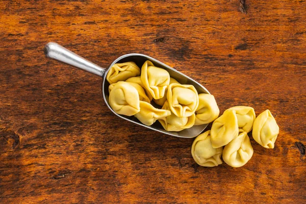 Tortellini Pasta Italian Stuffed Pasta Scoop Wooden Table Top View — Stock Photo, Image