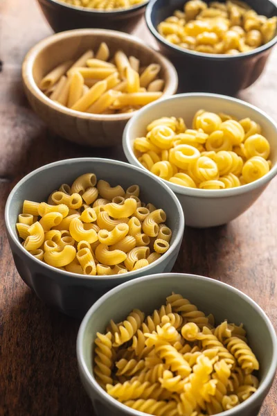 Various Types Raw Italian Pasta Bowls Kitchen Table — Stock Photo, Image