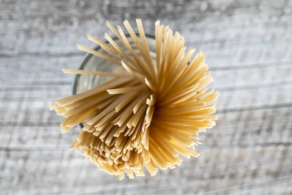 Uncooked udon noodles. Traditional Japanese noodles. Top view.