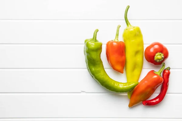 Various Types Peppers Vegetables White Table Top View — Stock Photo, Image