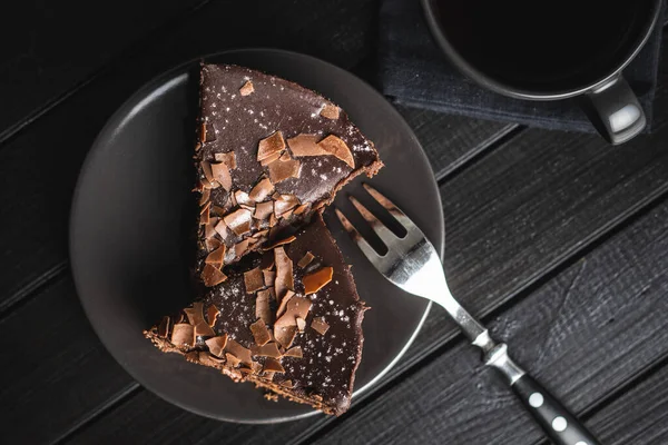 Süßer Schokoladenkäsekuchen Auf Schwarzem Holztisch Ansicht Von Oben — Stockfoto
