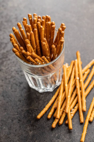 Salty Sticks Crunchy Pretzels Glass Black Table — Stock Photo, Image