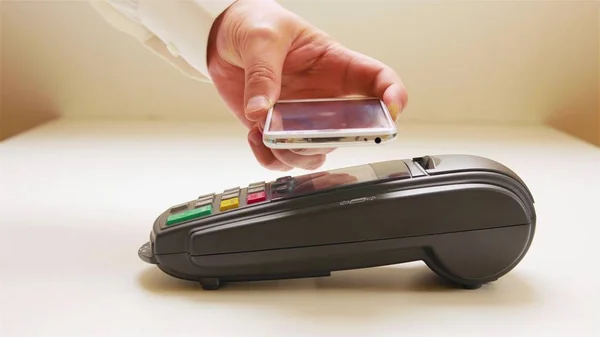 Man Paying Bill Smartphone Using Nfc Technology Restaurant Cafe Bar — Stock Photo, Image