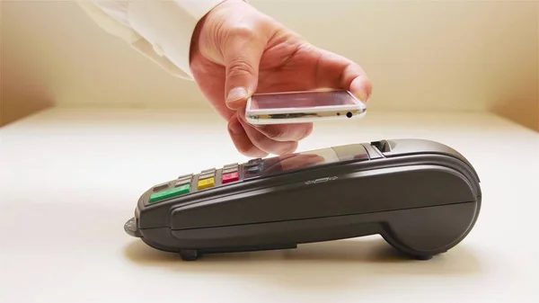 Man Paying Bill Smartphone Using Nfc Technology Restaurant Cafe Bar — Stock Photo, Image