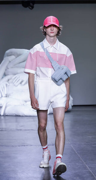 New York, NY, USA - July 10, 2018: A model walks runway for Feng Chen Wang Spring/Summer 2019 runway show during NY Fashion Wweek: Mens at Industria Studios, Manhattan