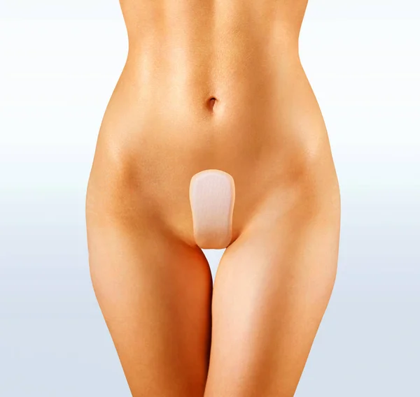Shape of woman and sanitary pad — Stock Photo, Image