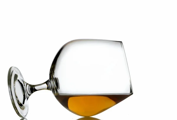 Brandy Snifter Laying Side Sitting Reflective Grey Surface Bright Background — Stock Photo, Image