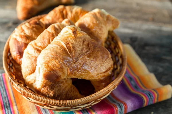 Warm Croissant Served Wicker Serving Plate Striped Napkin Old Wood — Stock Photo, Image