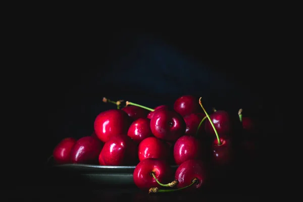Dark Red Cherries Pewter Plate Low Light Closeup Horizontal Composition — Stock Photo, Image