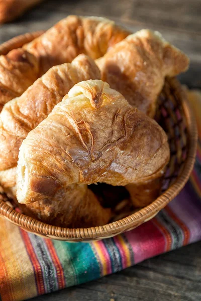 Warm Croissant Served Wicker Serving Plate Striped Napkin Old Wood — Stock Photo, Image