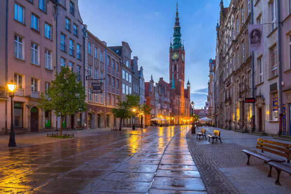 Gdansk, Poland - May 5, 2018: Architecture of the old town in Gdansk with city hall at dawn, Poland. Gdansk is the historical capital of Polish Pomerania with beautiful architecture.