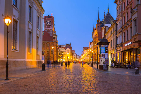 Torun, Poland - March 30, 2019: Architecture of the old town in Torun at dusk, Poland. Torun is one of the oldest cities in Poland and the birthplace of the astronomer Nicolaus Copernicus.