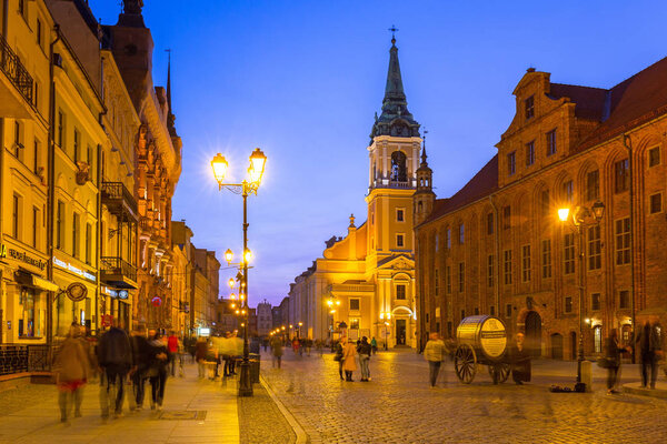Torun, Poland - March 30, 2019: Architecture of the old town in Torun at dusk, Poland. Torun is one of the oldest cities in Poland and the birthplace of the astronomer Nicolaus Copernicus.