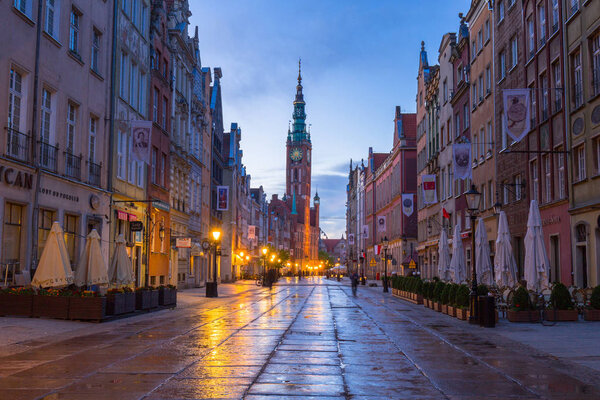 Gdansk, Poland - May 5, 2018: Architecture of the old town in Gdansk with city hall at dawn, Poland. Gdansk is the historical capital of Polish Pomerania with beautiful architecture.