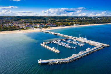 Aerial view of the Baltic sea coastline and wooden pier in Sopot, Poland clipart
