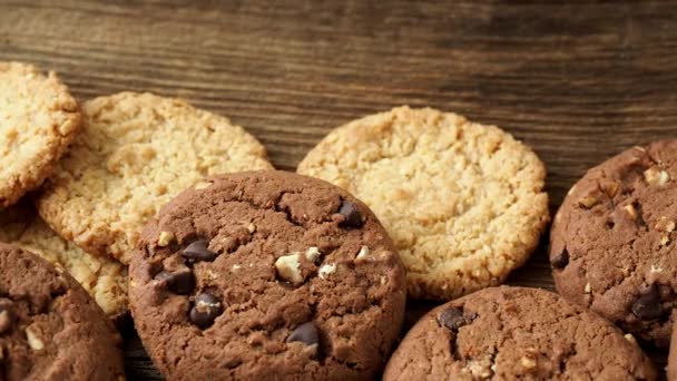 Various Tasty Cookies Biscuits Wooden Background — Stock Video