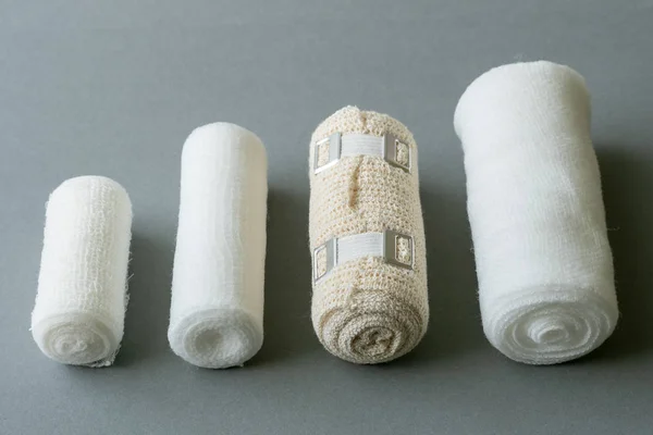 Different Sizes Medical Bandages Medical Bandages Grey Background Medical Equipment — Stock Photo, Image