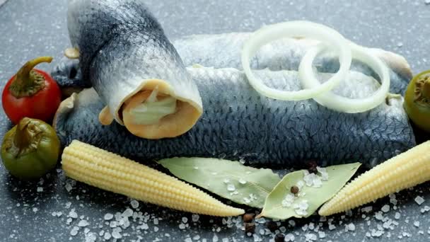 Cold appetizer. Herring fillet marinated. View from above. Marinated sea fish. 4k resolution. — Stock Footage Cold Appetizer Herring Fillet Marinated View Marinated Sea Fish Resolution Stock Video