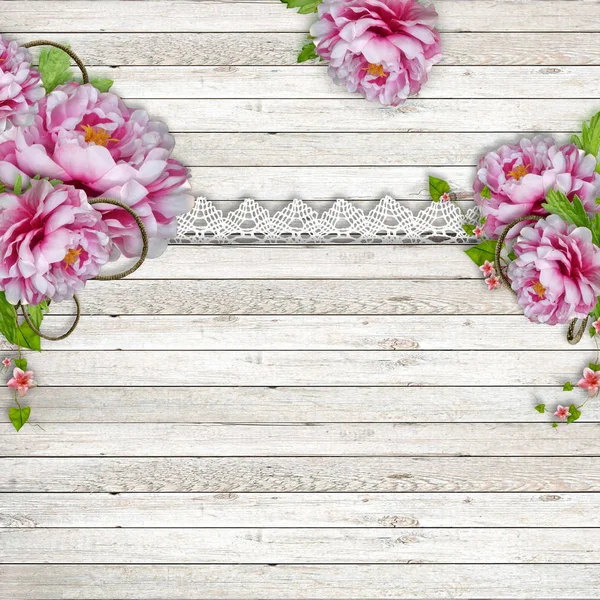 Vintage wooden background with beautiful pink peonies and lace Stock Picture