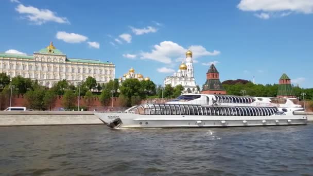 Moscow, Russia - May 12. 2018. Radisson Royal steam-ship fleet sails past Kremlin — Stock Video