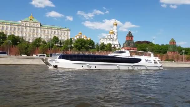 Moscow, Russia - May 12. 2018. Radisson Royal steam-ship fleet sails past Kremlin — Stock Video