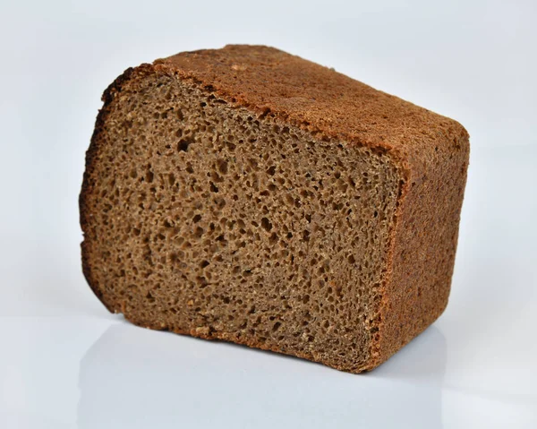 Large Piece Black Rye Bread Light Background — Stock Photo, Image