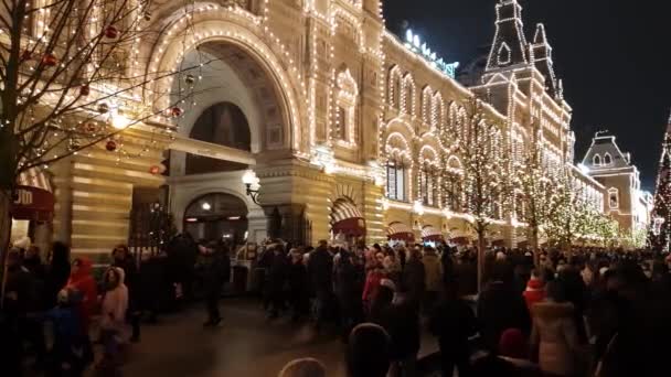Moscow, Russia - January 7.2019. People on Christmas Fair on Red Square near Gum store — Stock Video