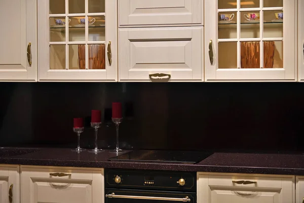 Beige kitchen set with stove in the room — Stock Photo, Image