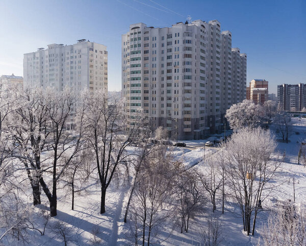 View of the snow-covered city park from above. Moscow, Russia