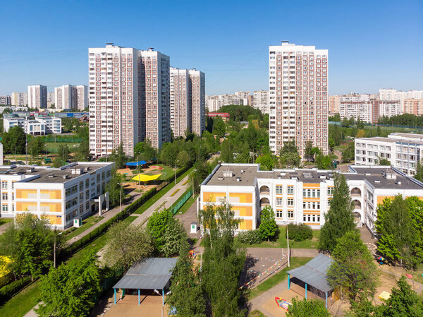 The Cityscape in Moscow from above, Residential buildings, school and kindergarden. Россия
