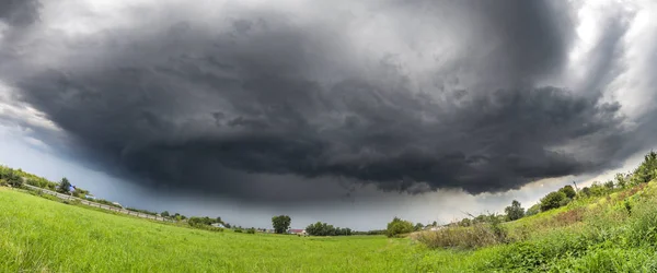 Panorama of Summer countryside landscape with a thundercloud — Stock Photo, Image