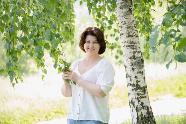 Woman Stands Birch Holding Branch — Stock Photo, Image