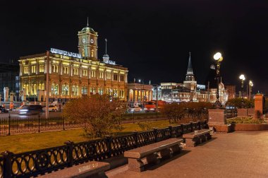 Moscow. Komsomolskaya square. Leningradsky railway station in the night clipart