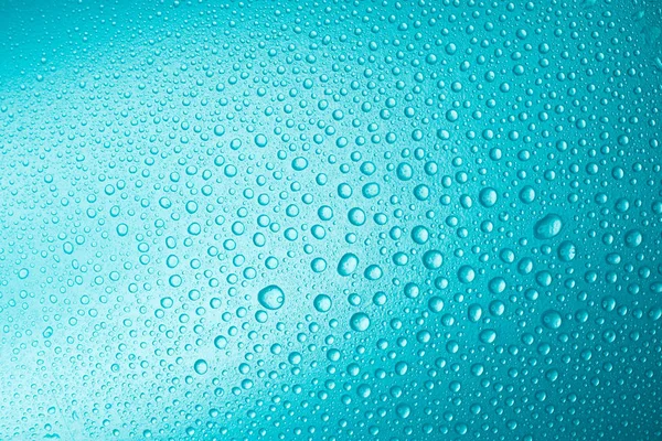 Salpicaduras Gotas Agua Sobre Fondo Azul —  Fotos de Stock