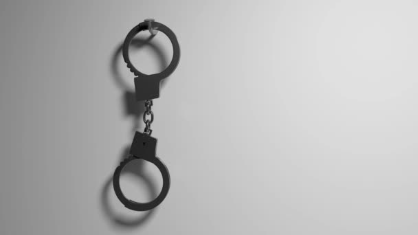 Дублирующие наручники на гвоздь . — стоковое видео