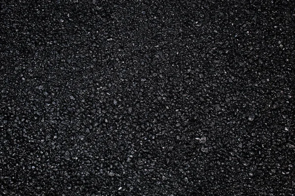 Donkere asfalt ballastbed. — Stockfoto