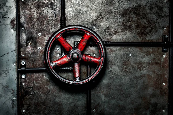 Den röda ventilen på dörren. — Stockfoto
