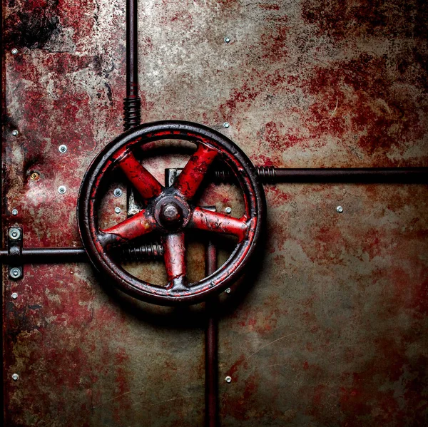 A válvula vermelha na porta . — Fotografia de Stock